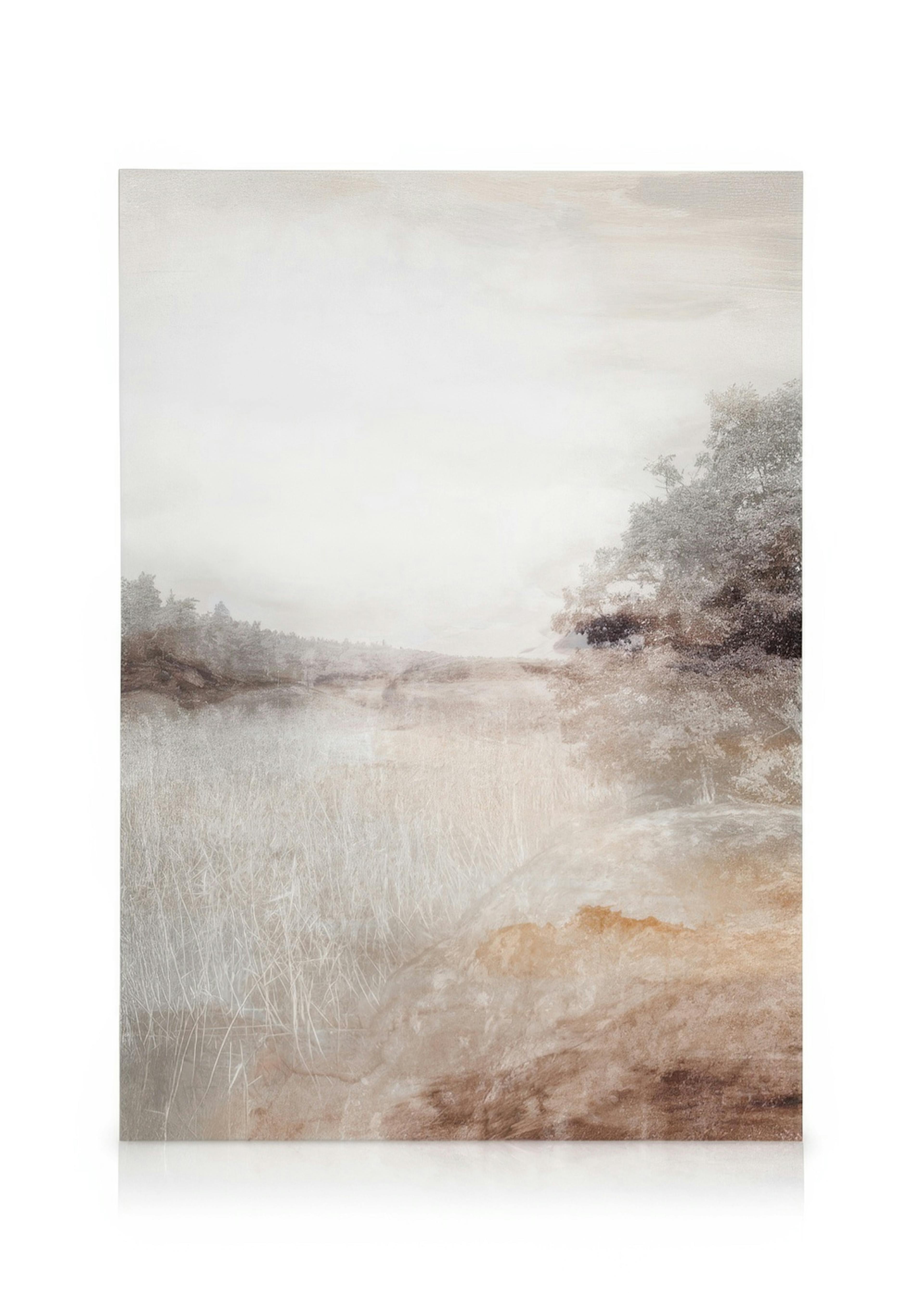 A serene river landscape canvas print in muted brown and grey tones, hanging above a wooden console table in a minimalist living