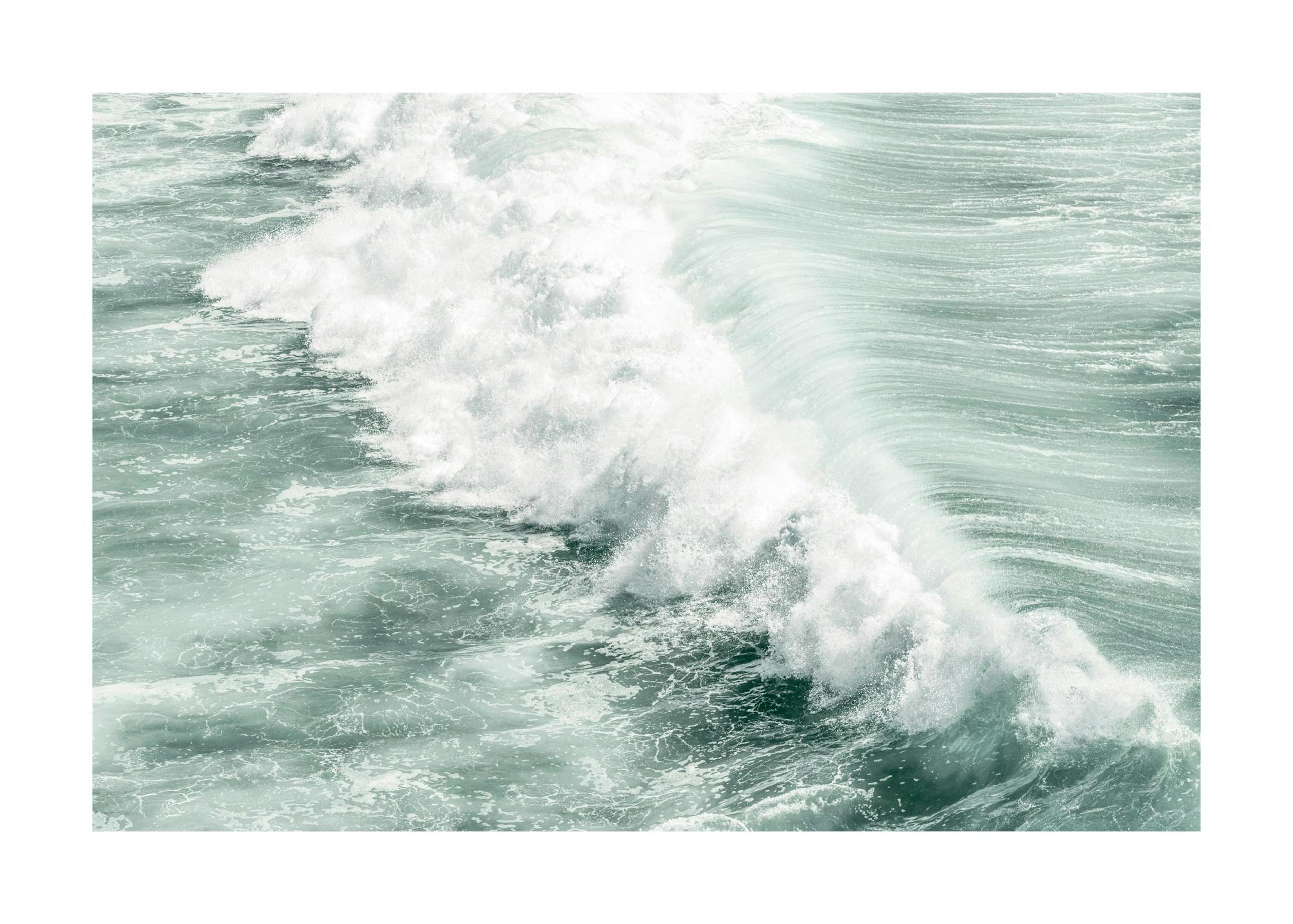 Turquoise wave print: close-up photograph of a large ocean wave cresting with white foam in a landscape format.