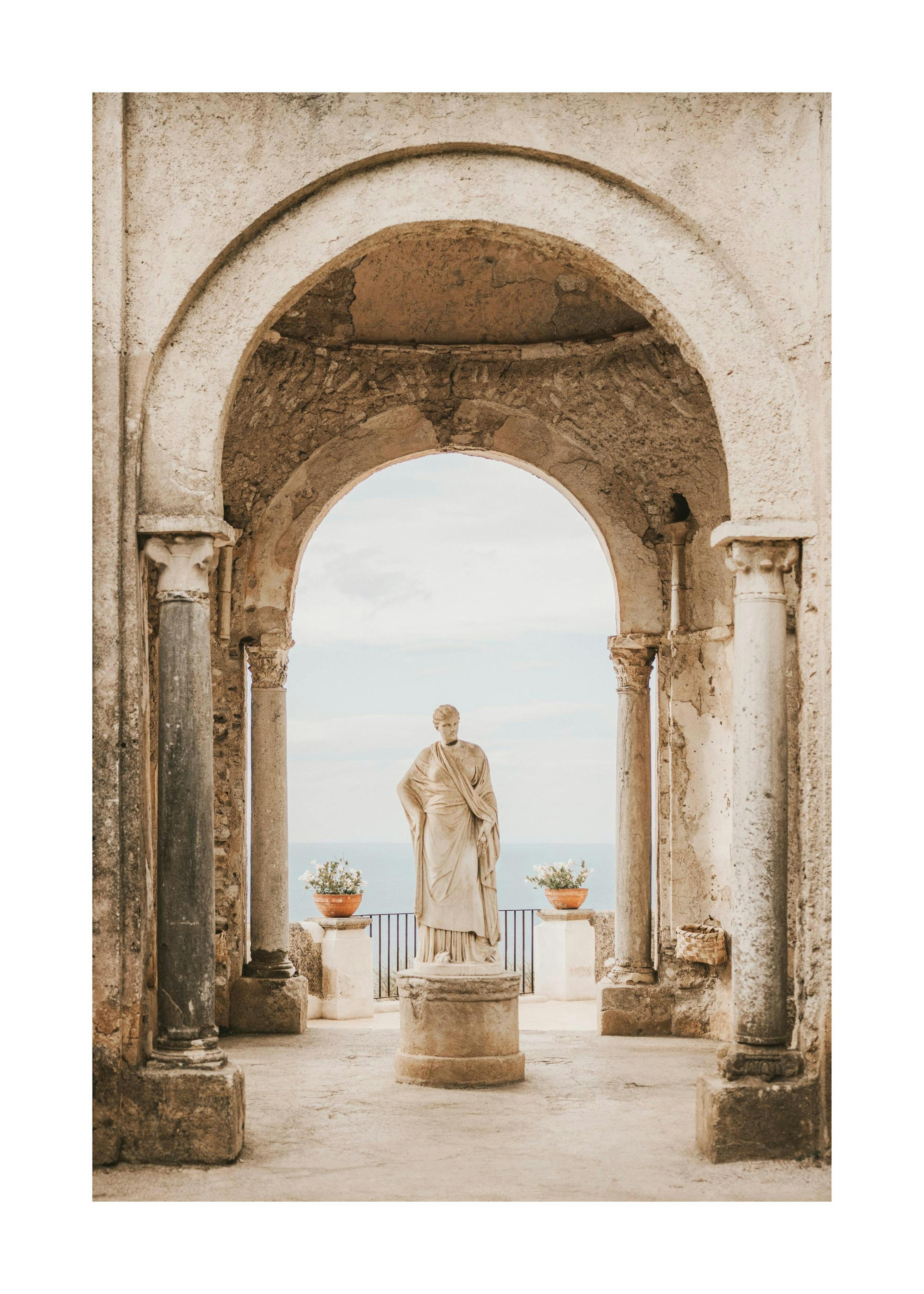 Historic Villa Cimbrone Gardens statue print, Italy. Roman architecture, classic archway, and sea view evoke Italian history.